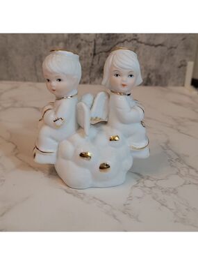 vintage two little angels sitting on a cloud figurine